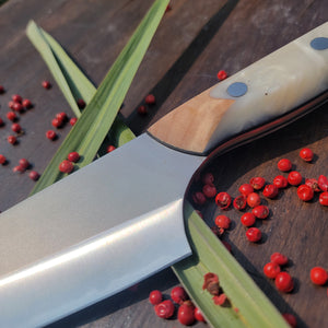 Big Red with "Misty White" handle